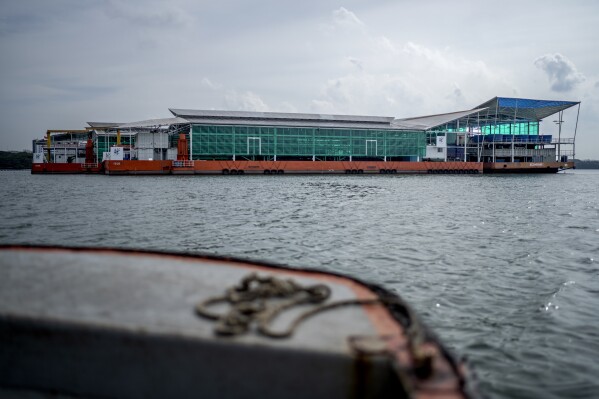 The Eco-Ark floating fish farm in Singapore, Friday, July 21, 2023. The “closed containment” aquaculture farm can produce 400 tons of Asian seabass and fourfinger threadfin a year. (AP Photo/David Goldman)