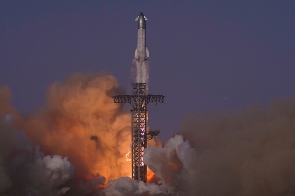 SpaceX's mega rocket Starship makes a test flight from Starbase, Texas, Tuesday, May 27, 2025. (AP Photo/Eric Gay)