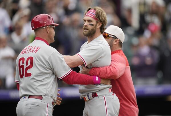 Harper ejected for charging dugout, Freeland pitches Rockies past Phillies  4-0 on 30th birthday