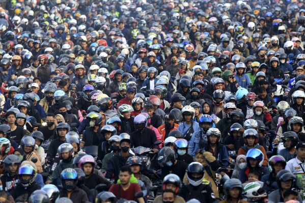 AP PHOTOS: Indonesia expects biggest-ever Eid homecoming, a mass movement of over 190 million people