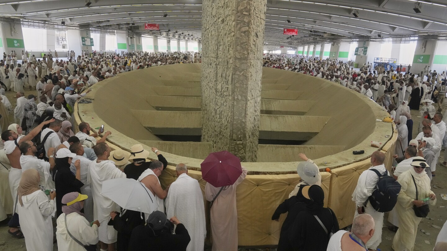 Symbolism and smiles during the stoning of the devil ritual at the Hajj