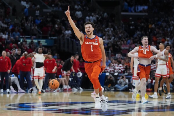 Clemson guard Chase Hunter (1) celebrates after a win over Arizona in a Sweet 16 college basketball game in the NCAA tournament Thursday, March 28, 2024, in Los Angeles. (AP Photo/Ryan Sun)