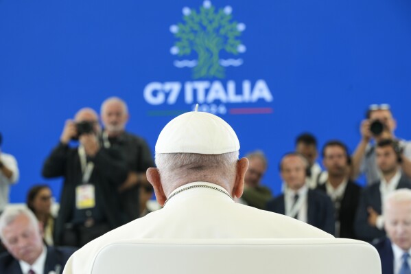 Pope Francis sits during a working session on AI, Energy, Africa and Mideast, at the G7, Friday, June 14, 2024, in Borgo Egnazia, near Bari, southern Italy. (AP Photo/Alex Brandon)