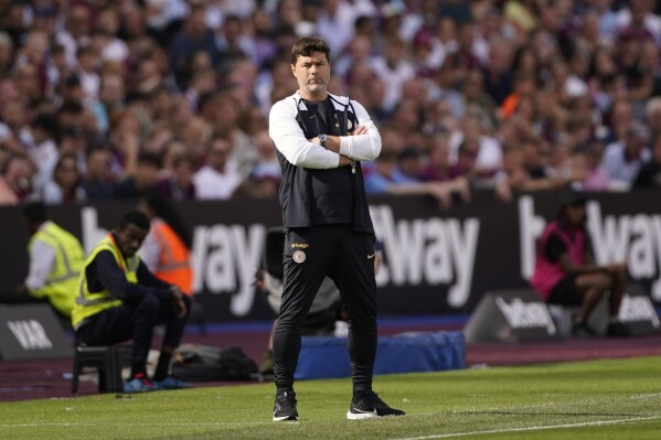 Chelsea's head coach Mauricio Pochettino stands during the English Premier League soccer match between West Ham and Chelsea, at the London Stadium in London, Sunday, Aug. 20, 2023. (AP Photo/Alberto Pezzali)