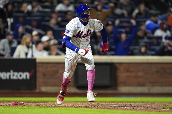 New York Mets' Brandon Nimmo (9) runs towards first base after hitting a game-winning two-run home run during the ninth inning of a baseball game against the Atlanta Braves, Sunday, May 12, 2024, in New York. The Mets won 4-3. (AP Photo/Julia Nikhinson)
