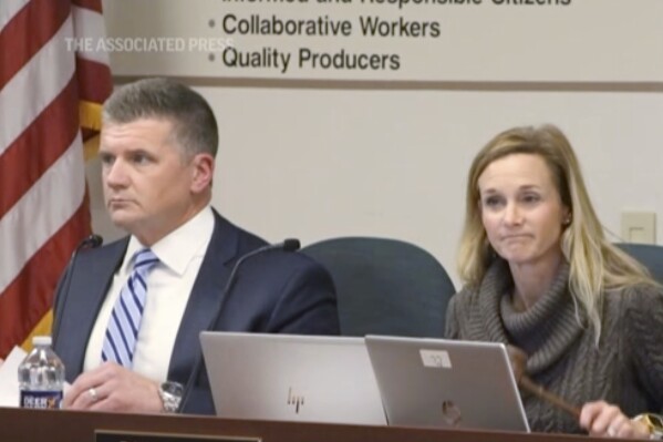 This image taken from video shows Superintendent Abram Lucabaugh and Board President Dana Hunter preside over a Central Bucks School District meeting in Doylestown Pa., Nov. 15, 2022. Democrats who swept out a Moms for Liberty majority on the board are challenging Lucabaugh's last-minute $700,000 exit package. (AP Photo)