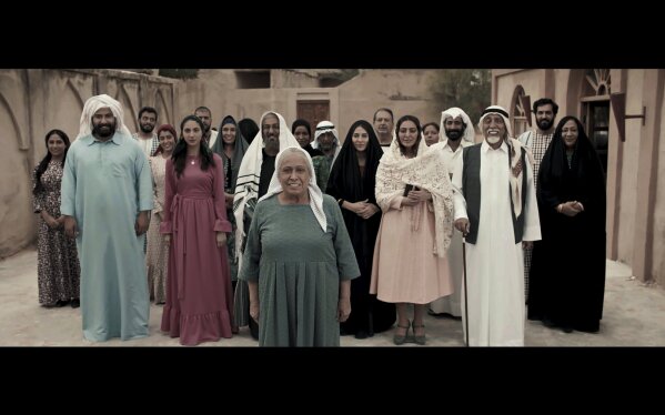 This undated publicity photo shows the cast and characters of "Umm Haroun," a Saudi-made television series aired during Ramadan that has sparked controversy by offering a positive depiction of a Jewish community in the Gulf that existed before the creation of Israel. (MBC Group via AP)