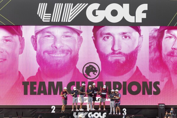 First place team champions, Kieran Vincent, Captain Jon Rahm, Caleb Surratt and Tyrrell Hatton celebrate onstage after the final round of LIV Golf Miami at the Trump National Doral on Sunday, April 7, 2024, in Doral, Fla. (Photo by Scott Taetsch/LIV Golf via AP)