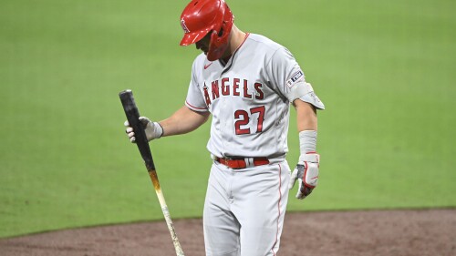 Los Angeles Angels' Mike Trout (27) leaves the game during the eighth inning of a baseball game against the San Diego Padres Monday, July 3, 2023, in San Diego. (AP Photo/Denis Poroy)