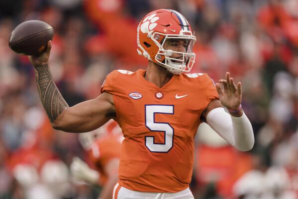 Clemson quarterback DJ Uiagalelei passes the ball in the first half of an NCAA college football game against Miami on Saturday, Nov. 19, 2022, in Clemson, S.C. (AP Photo/Jacob Kupferman)