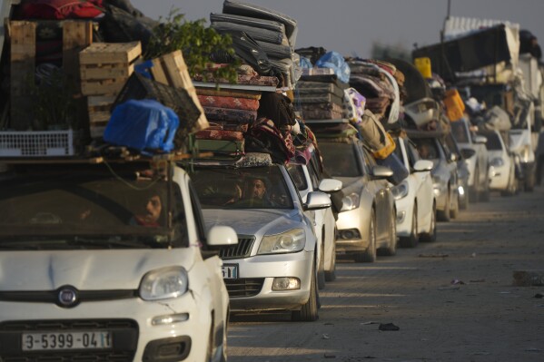 displaced palestinians make their way from central gaza to their homes in the northern gaza strip, wednesday, jan. 29, 2025, after israel began allowing hundreds of thousands of palestinians return as part of the ceasefire deal between israel and hamas. (ap photo/abdel kareem hana)