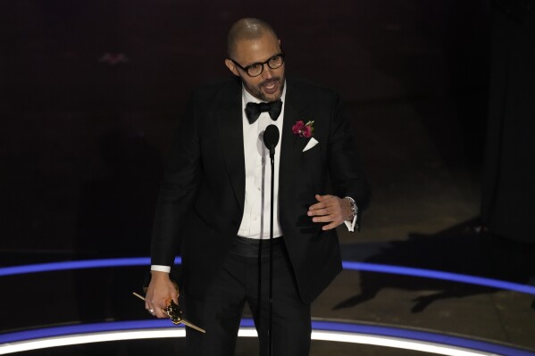 Cord Jefferson accepts the award for best adapted screenplay for 