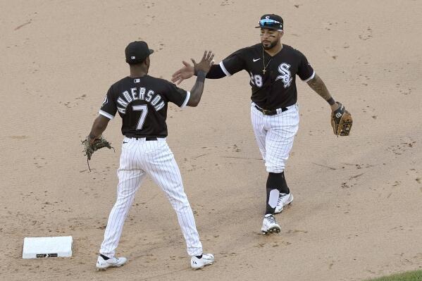 Chicago White Sox's Billy Hamilton (0) and Tim Anderson (7