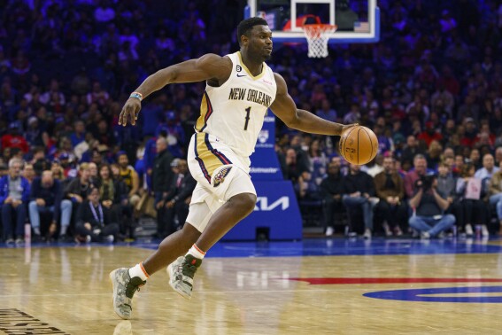 FILE - New Orleans Pelicans' Zion Williamson drives with the ball during the NBA basketball team's game against the Philadelphia 76ers on Jan. 2, 2023, in Philadelphia. Williamson, his stepfather and his mother allegedly have failed to pay back $1.8 million of a $2 million loan from a California-based technology company. In a civil lawsuit filed this week in U.S. District Court in New Orleans, Ankr PBC stated that it made the loan in September 2021 to Williamson and family members while in the midst of trying to establishing a marketing relationship with the Pelicans' All-Star power forward. (AP Photo/Chris Szagola, File)