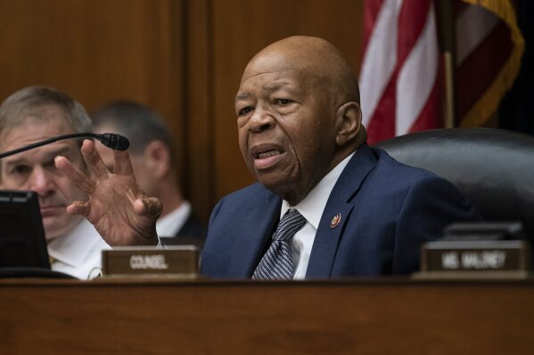 House Oversight and Reform Committee Chairman Elijah E. Cummings, D-Md., joined at left by Rep. Jim Jordan, R-Ohio, the ranking member, considers whether to hold Attorney General William Barr and Commerce Secretary Wilbur Ross in contempt for failing to turn over subpoenaed documents related to the Trump administration's decision to add a citizenship question to the 2020 census, on Capitol Hill in Washington, Wednesday, June 12, 2019. (AP Photo/J. Scott Applewhite)