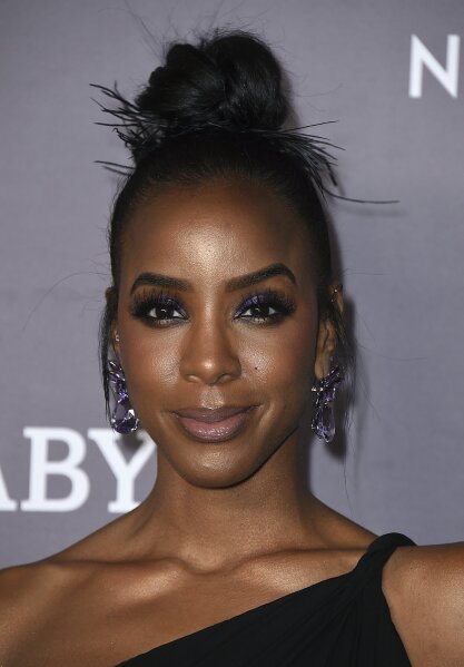 FILE - Kelly Rowland arrives at the 2019 Baby2Baby Gala in Culver City, Calif. on Nov. 9, 2019. Rowland released an EP titled “K,” featuring six tracks heavily influenced by Afrobeat rhythms. (Photo by Jordan Strauss/Invision/AP, File)