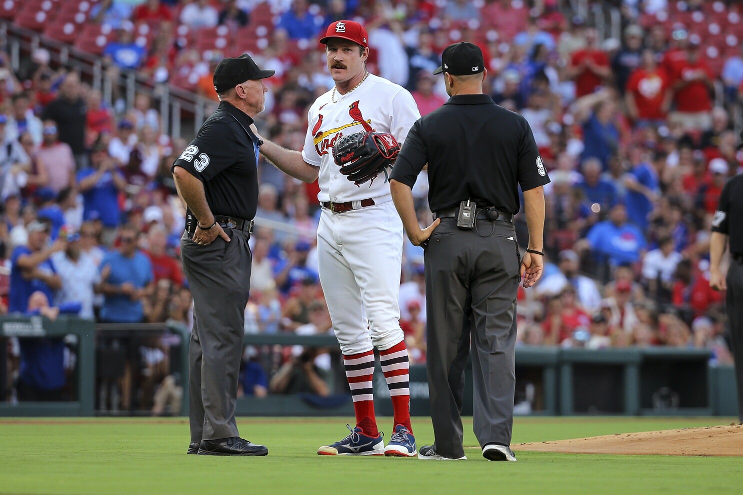 Mikolas leads Cardinals with arm and bat