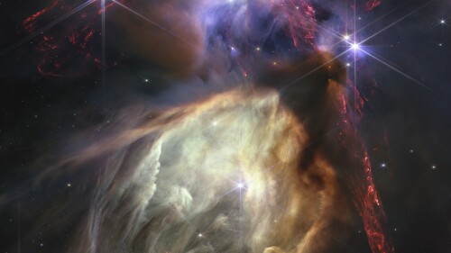 The first anniversary image released Wednesday, July 12, 2023, by Space Telescope Science Institute Office of Public Outreach, shows NASA’s James Webb Space Telescope displaying a star birth like it’s never been seen before, full of detailed, impressionistic texture. The subject is the Rho Ophiuchi cloud complex, the closest star-forming region to Earth. (NASA, ESA, CSA, STScI, Klaus Pon via AP)