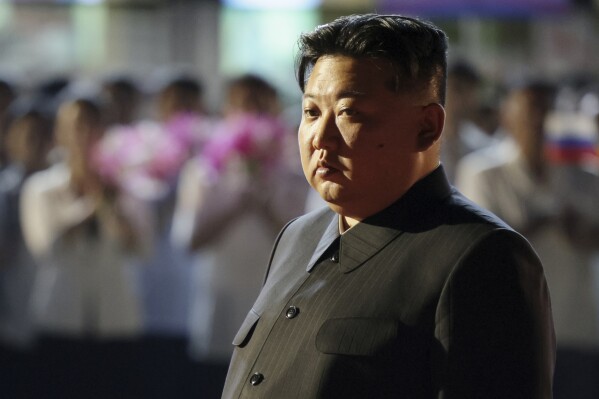 North Korean leader Kim Jong Un stands during Russian President Vladimir Putin's departure ceremony at an international airport outside Pyongyang, North Korea, Wednesday, June 19, 2024. (Gavriil Grigorov, Sputnik, Kremlin Pool Photo via AP)