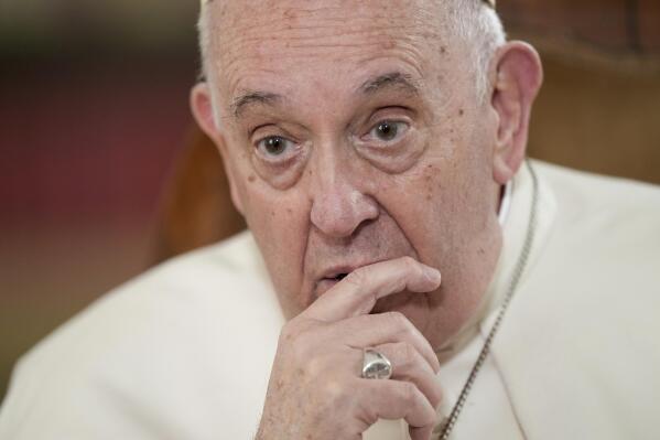 Pope Francis speaks during an interview with The Associated Press at the Vatican, Tuesday, Jan. 24, 2023. Francis acknowledged that Catholic bishops in some parts of the world support laws that criminalize homosexuality or discriminate against the LGBTQ community, and he himself referred to homosexuality in terms of "sin." But he attributed attitudes to culture backgrounds, and said bishops in particular need to undergo a process of change to recognize the dignity of everyone. (AP Photo/Andrew Medichini)