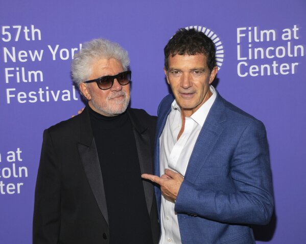 FILE - This Sept. 28, 2019 file photo shows actor Antonio Banderas, right, and director/screenwriter Pedro Almodovar at the premiere of "Pain and Glory" during the 57th New York Film Festival in New York. Almodóvar has found international acclaim with 21 films shot in his native Spain. He says that his next production will be set in Texas and would be mostly in English, with some bilingual scenes in Mexico. (Photo by Brent N. Clarke/Invision/AP, File)