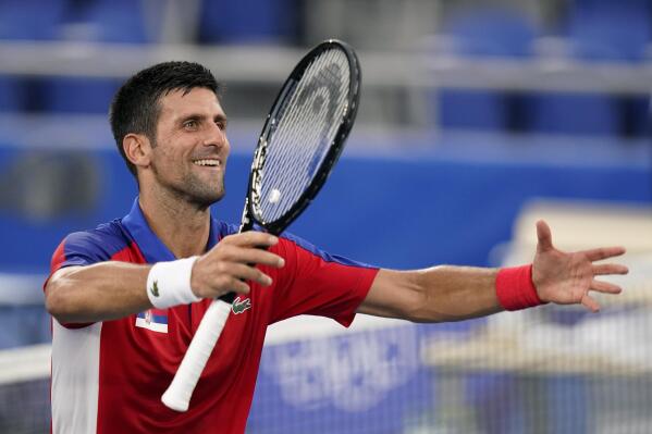 Novak Djokovic, of Serbia, gestures after defeating Jan-Lennard Struff, of Germany, in the second round of the tennis competition at the 2020 Summer Olympics, Monday, July 26, 2021, in Tokyo, Japan. (AP Photo/Patrick Semansky)