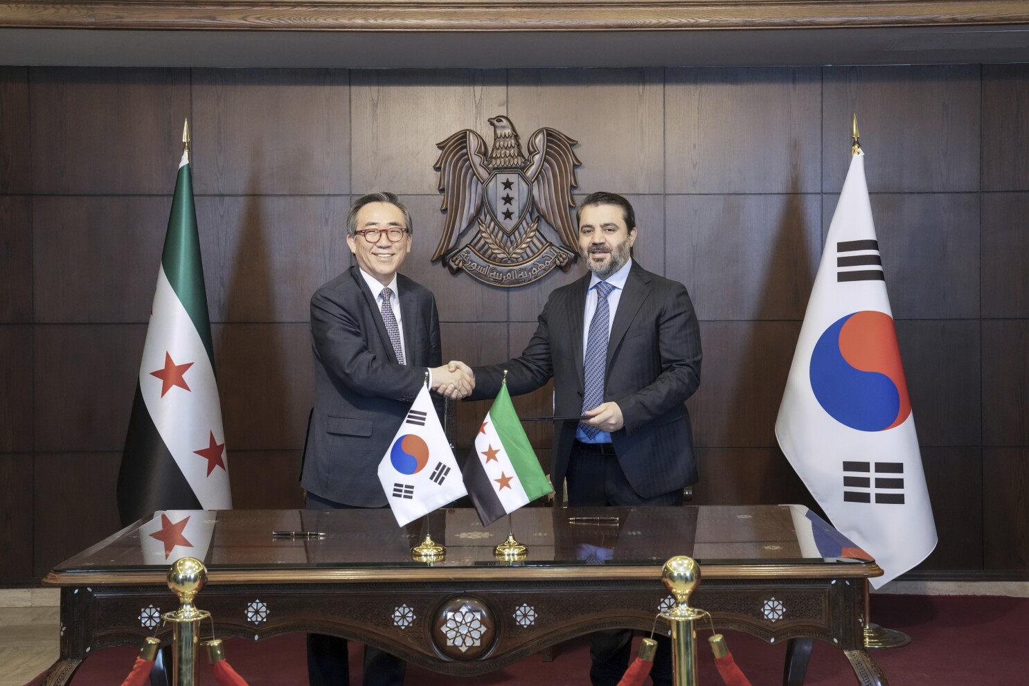 South Korea establishes diplomatic relations with Syria, a longtime friend of rival North Korea