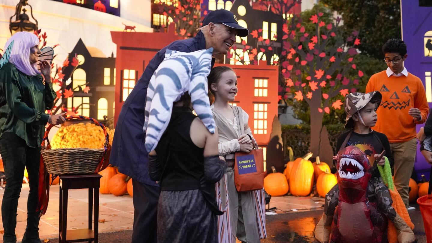 Bidens dole out Halloween candy to first responders’ kids