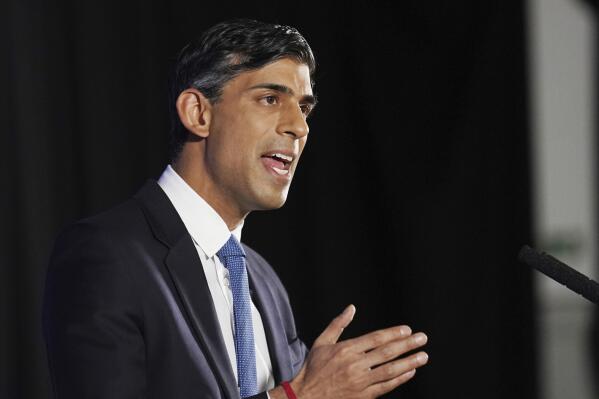 Britain's Prime Minister Rishi Sunak gestures during his first major domestic speech of 2023 at Plexal, Queen Elizabeth Olympic Park in east London, Wednesday Jan. 4, 2023. (Stefan Rousseau/Pool photo via AP)