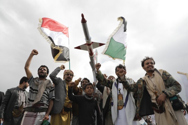 Houthi supporters attend a rally against the U.S. airstrikes on Yemen and the Israeli offensive against the Palestinians in Gaza SAtrip, in Sanaa, Yemen, Friday, March 8, 2024. (AP Photo/Osamah Abdulrahman)