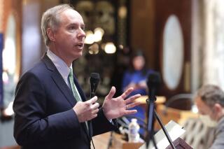 FILE - In this April 14, 2020 file photo, Wisconsin Assembly Speaker Robin Vos speaks at the state Capitol in Madison Wis. One of the retired police officers hired by Vos to investigate the presidential election in the battleground state has ties to the GOP and previously led a probe into voter fraud in Milwaukee. (Rick Wood/Milwaukee Journal-Sentinel via AP, File)