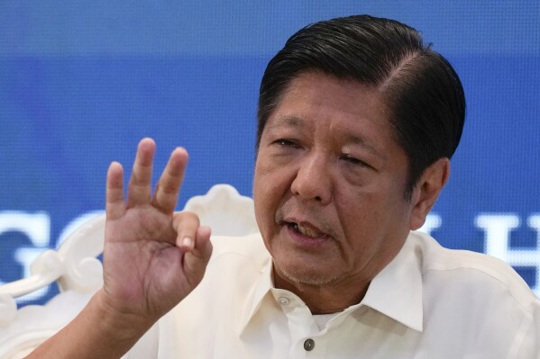 Philippine President Ferdinand Marcos Jr. answers questions during a forum of the Foreign Correspondents Association of the Philippines on Monday, April 15, 2024, in Manila, Philippines. (AP Photo/Aaron Favila)