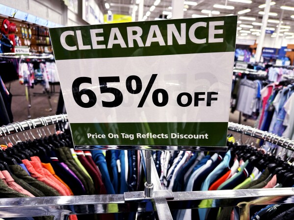 A clearance sign is displayed at a retail clothing store in Downers Grove, Ill., Tuesday, March 12, 2024. On Friday, March 29, 2024, the government issues its latest monthly report on the Federal Reserve’s preferred inflation gauge, a key measure of how well the Fed’s drive to tame inflation is succeeding. (AP Photo/Nam Y. Huh)
