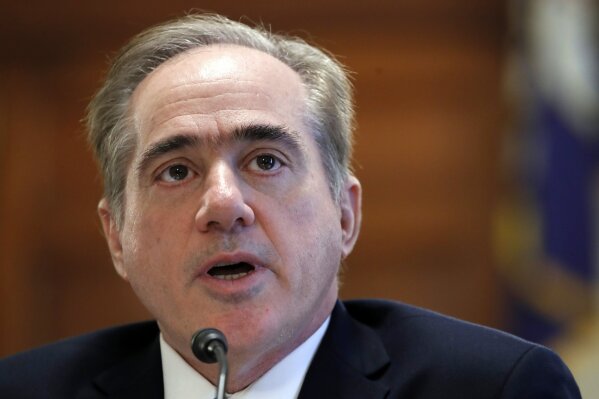 
              FILE - In this Feb. 6, 2018, file photo, Veterans Affairs Secretary David Shulkin speaks during a House Committee on Veterans' Affairs hearing on veteran caregiver support on Capitol Hill in Washington. Shulkin is hanging onto his job by a thread. He faces an insurgency from within his department and new allegations that he had a member of his security detail go shopping with him at Home Depot and then cart the purchases into his house. (AP Photo/Jacquelyn Martin, File)
            