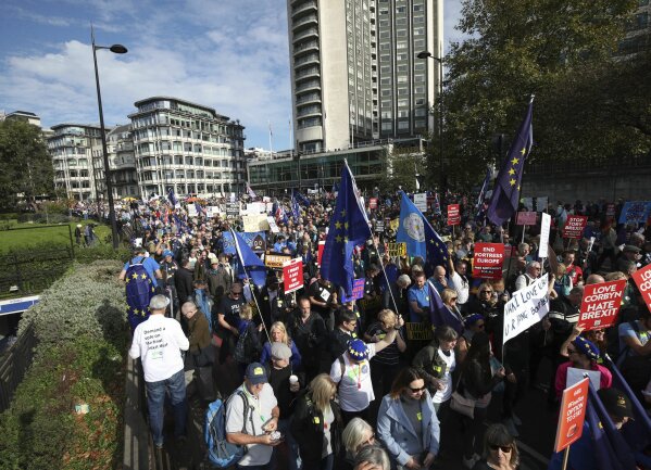 
              Anti-Brexit campaigners take part in the People's Vote March for the Future in London,  a march and rally in support of a second EU referendum, in London, Saturday Oct. 20, 2018. Thousands of protesters gathered in central London on Saturday to call for a second referendum on Britain’s exit from the European Union.  (Yui Mok/PA via AP)
            