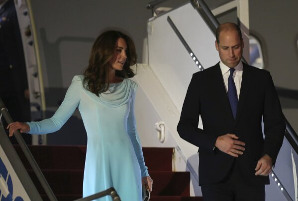 Britain's Prince William and his wife Kate arrive at Nur Khan base in Islamabad, Pakistan, Monday, Oct. 14, 2019. They are on a five-day visit, which authorities say will help further improve relations between the two countries. (AP Photo/B.K. Bangash)