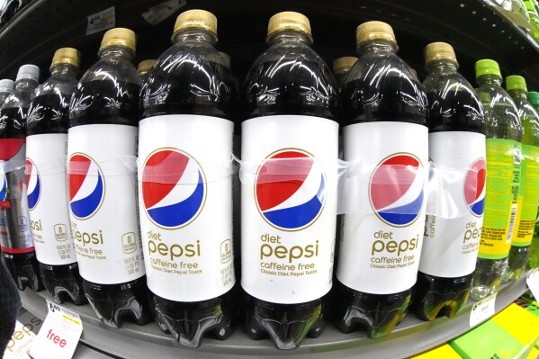 FILE - Diet Pepsi Caffeine Free is displayed in a market in Pittsburgh on Jan. 26, 2023. PepsiCo reports earnings on Thursday, July 11, 2024. (ĢӰԺ Photo/Gene J. Puskar, File)