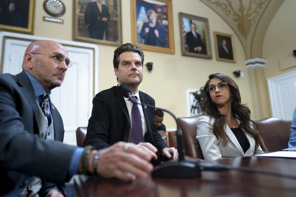 FILE - From left, Rep. Clay Higgins, R-La., Rep. Matt Gaetz, R-Fla., and Rep. Lauren Boebert, R-Colo., propose amendments to the Department of Homeland Security Appropriations Bill before the House Rules Committee, at the Capitol in Washington, Friday, Sept. 22, 2023. (AP Photo/J. Scott Applewhite, File)