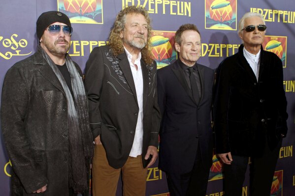 FILE - This Oct. 9, 2012 file photo shows, from left, Jason Bonham, son of the late Led Zeppelin drummer John Bonham; singer Robert Plant; bassist John Paul Jones; and guitarist Jimmy Page at the "Led Zeppelin: Celebration Day" premiere in New York.  Members of an 11-judge panel of the 9th U.S. Circuit Court of Appeals harshly challenged plaintiffs who argued that a new trial in the copyright fight over Led Zeppelin’s “Stairway to Heaven is justified. The lawsuit that alleges 1971’s “Stairway” was stolen from 1968’s “Taurus,” by Spirit. (Photo by Dario Cantatore/Invision/AP, File)