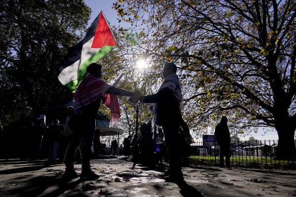Protesters gather in Hyde Park for a pro-Palestinian protest in London, Saturday, Nov. 11, 2023. (AP Photo/Alberto Pezzali)