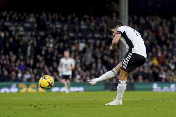 Fulham's Manor Solomon scores his side's second goal of the game, during the English Premier League soccer match between Fulham and Nottingham Forest at Craven Cottage, London, Saturday, Feb. 11, 2023. (Adam Davy/PA via AP)
