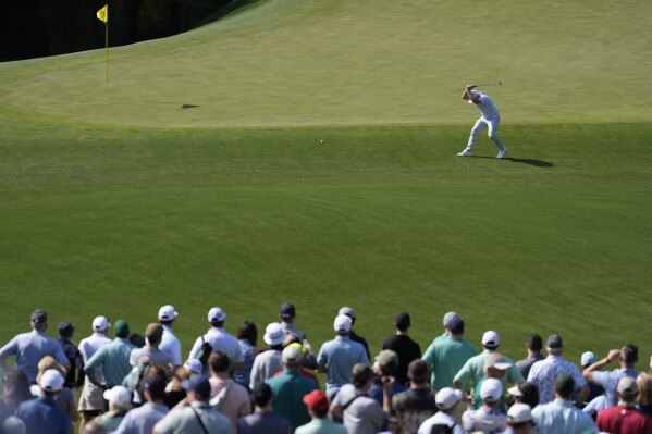 Tyrrell Hatton, of England, reacts on the 11th hole during a practice round in preparation for the Masters golf tournament at Augusta National Golf Club Wednesday, April 10, 2024, in Augusta, GA. (AP Photo/Ashley Landis)