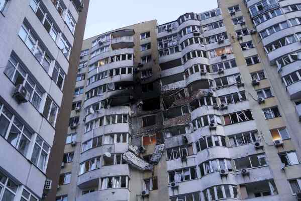 A residential multi-storey building is seen damaged after a Russian drone strike on Kyiv, Ukraine, on Friday, June 6, 2025. (AP Photo/Evgeniy Maloletka)
