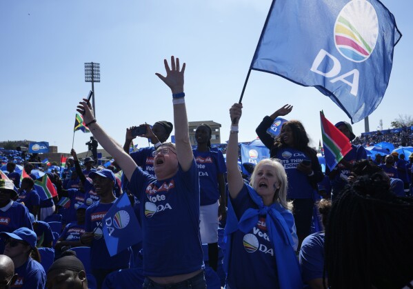 FILE - Supporters of the main opposition Democratic Alliance (DA) party attend a final election rally, in Benoni, South Africa, on May 26, 2024. (AP Photo/Themba Hadebe, File)