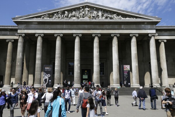 FILE - Visitors walk outside the British Museum in Bloomsbury, London, Friday, June 26, 2015. The British Museum said a staff member was fired after items were found missing, stolen or damaged.  The museum said on Wednesday, August 16, 2023, that it has also ordered an independent security review and ordered a 