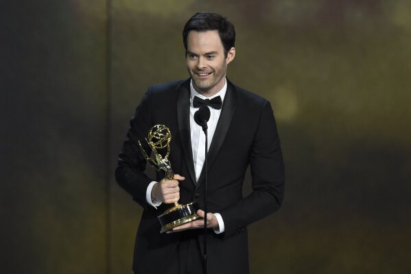 
              Bill Hader accepts the award for outstanding lead actor in a comedy series for "Barry" at the 70th Primetime Emmy Awards on Monday, Sept. 17, 2018, at the Microsoft Theater in Los Angeles. (Photo by Chris Pizzello/Invision/AP)
            