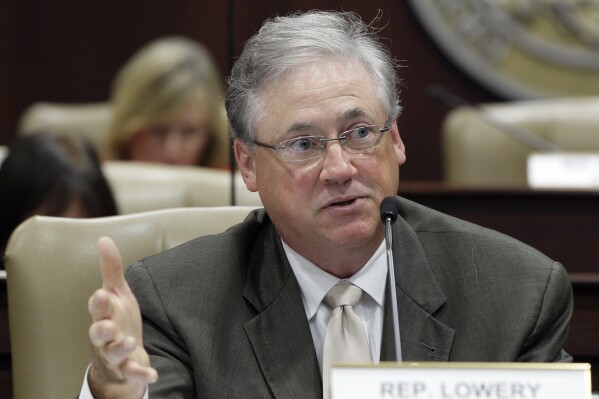 FILE - Arkansas Rep. Mark Lowery, R-Maumelle, speaks at the state Capitol in Little Rock, Ark., July 22, 2013. Lowery's office said the former state lawmaker died Wednesday morning at a Little Rock hospital from complications from his stroke. He was 66. (AP Photo/Danny Johnston, File)