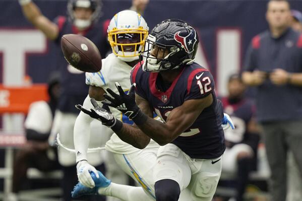 Ekeler scores 3 touchdowns, Chargers hold off Texans 34-24