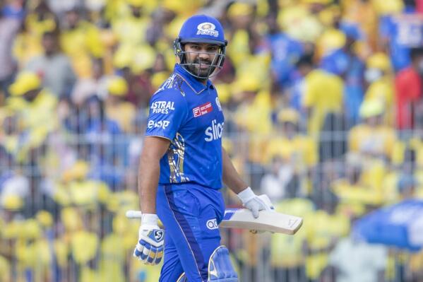 Rohit Sharma of Mumbai Indians walks off after losing the wicket to Deepak Chahar of Chennai Super Kings during the Indian Premier League cricket match between Chennai Super Kings and Mumbai Indian in Chennai, India, Saturday, May 6, 2023. (AP Photo/R. Parthibhan)