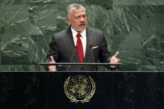 FILE - In this Sept. 24, 2019, file photo, Jordan's King Abdullah II addresses the 74th session of the United Nations General Assembly. The Trump administration is considering withholding aid to one of its closest Arab partners, Jordan, in a bid to secure the extradition of a woman convicted in Israel of a 2001 bombing that killed 15 people, including two American citizens. The extradition issue is likely to be raised this week when King Abdullah II speaks to several congressional committees to voice his opposition to Israel’s plans to annex portions of the West Bank. (AP Photo/Richard Drew, File)